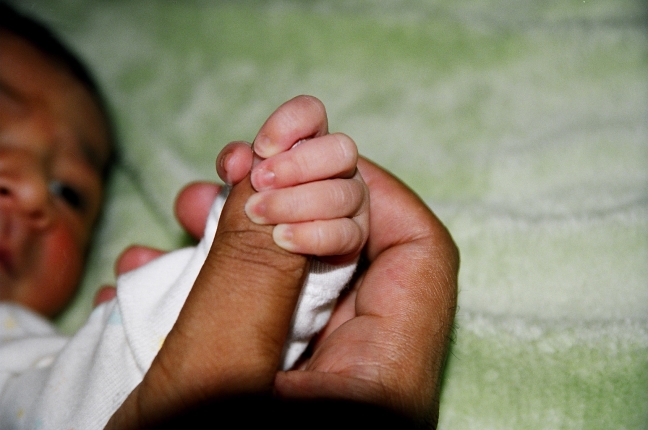 Holding daddy's finger